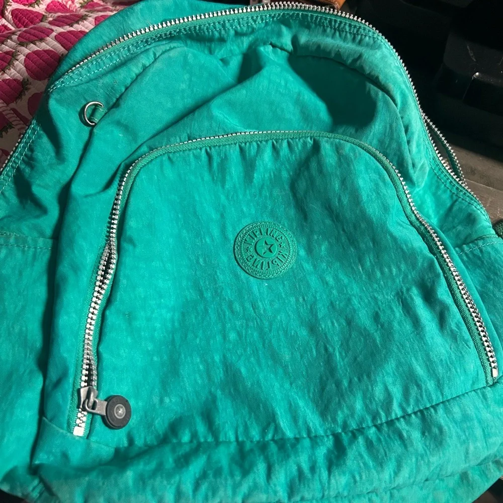 Kipling Turquoise Backpack with Silver Zippers